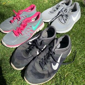 2 pairs of Nike tennis shoes sizes 7.5 and 8